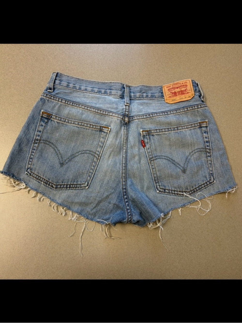 Levi's 569 Light Blue Frayed Denim Cutoff Shorts - Women's